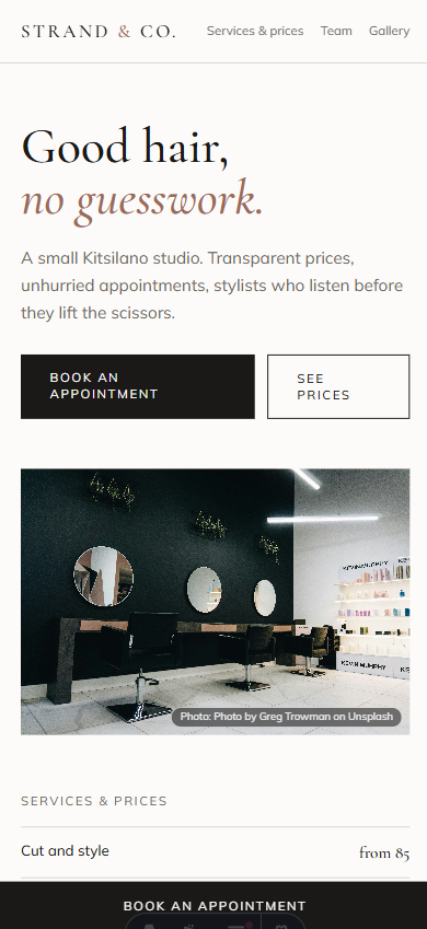 Strand & Co. homepage on a phone
